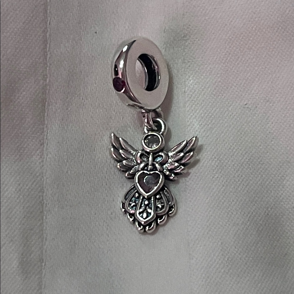 Sterling Silver Angel Charm Pendant with a Pink Gemstone Heart - Picture 9 of 11